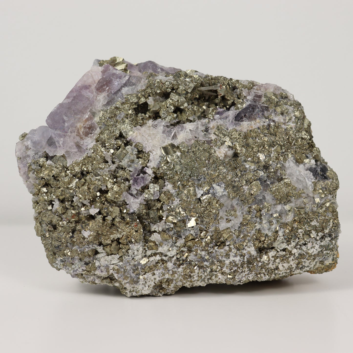 Pyrite Specimen with Clear Quartz and Amethyst Inclusions